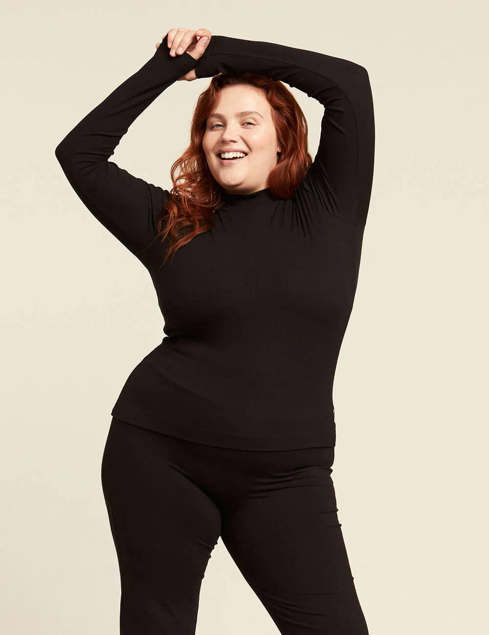 Ribbed Turtleneck Top. in Black